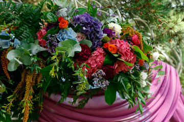 wedding ceremony decorations with colorful flowers