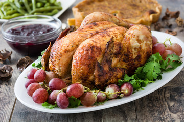 Thanksgiving dinner on rustic wooden background

