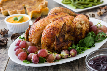 Thanksgiving dinner on rustic wooden background

