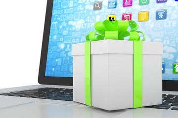 Gift box with ribbon on laptop keyboard. 3d rendering.