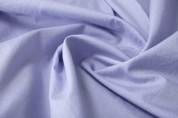 A full page close up of pastel purple shirt fabric texture