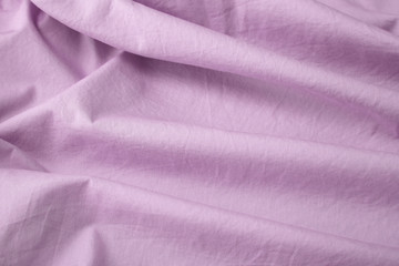 A full page close up of dusky pink shirt fabric texture