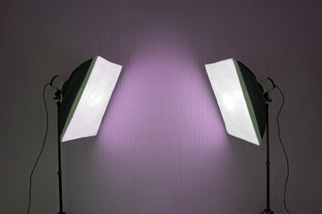 Photographic LIghting - Two Studio Lights with Soft Boxes on Tripods with purple background