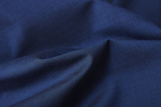 A Full Page Close Up Of Royal Blue Suit Fabric Texture