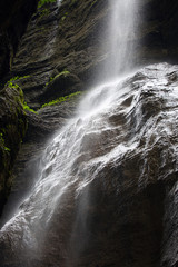 Waterfall in a mountain gorge