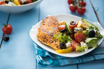 Grilled chicken with mediterranean salad