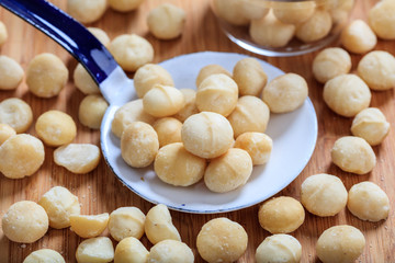 Macadamia nuts and an old ladle