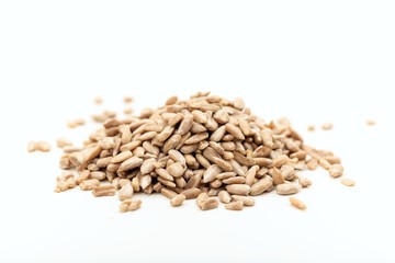 Sunflower seeds on white background