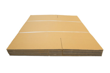 Stack of large corrugated cardboard box tied with nylon isolated on white background