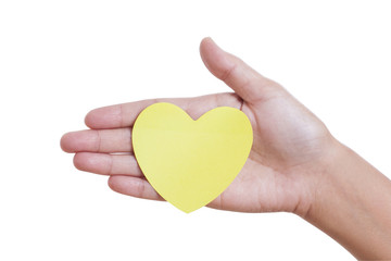 Fototapeta premium A female hand holding paper heart, isolated on white background. with using path 