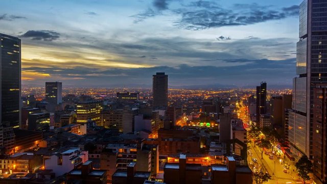 Day to night time lapse in Bogota, Colombia with the camera slowly zooming in