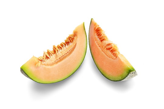 Slices appetizing orange Melon fruit isolated on white backgroun