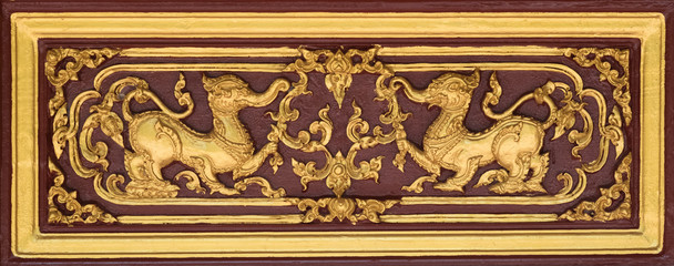 Thai traditional sculpture in Buddhist temple, Kochasri  mixed god animal between lion and elephant in Himmapan world.