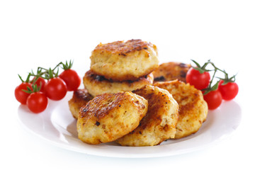 fried chicken cutlet with cherry tomatoes
