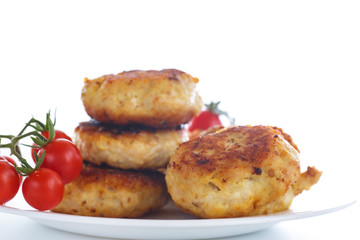 fried chicken cutlet with cherry tomatoes