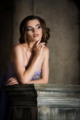 Beautiful brunette girl posing in the Studio. portrait
