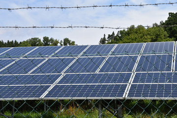 Solar power plant behind the fence