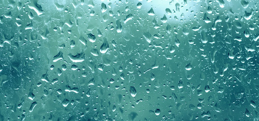 Rainy wet cold blue eco seasonal natural background with water drops