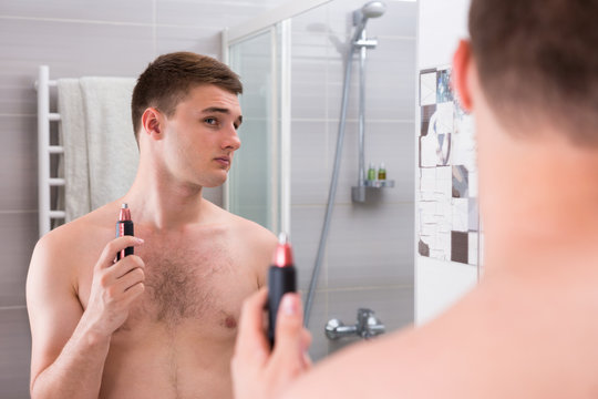 Man holding a trimmer