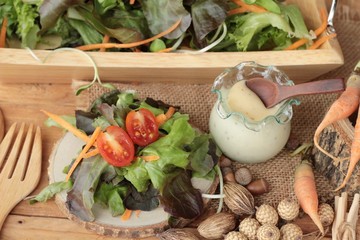 Vegetables salad with salad dressing is delicious.