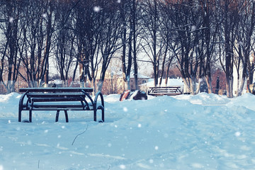 Winter street bench in city