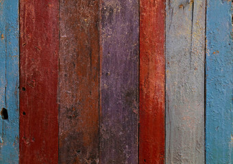 Multicolor painted old grunge wooden planks