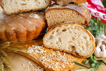 Freshly home baked sourdough spelt bread and traditional italian