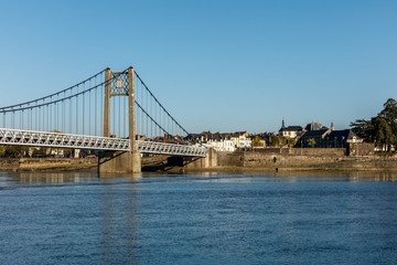Fototapeta na wymiar Suspension Bridge of the city of Ancienis in France