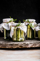Marinated zucchini with rosemary in jars