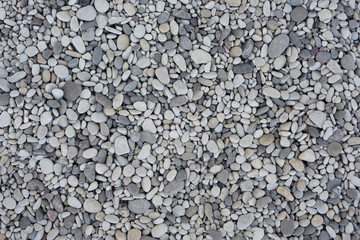 Nature background from gray sea pebbles