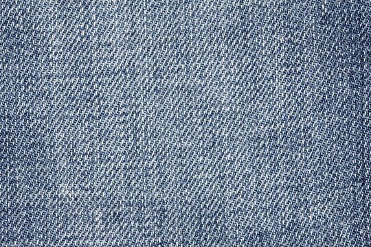 Denim jeans texture or denim jeans background. Old grunge vintage denim jeans. Stitched texture denim jeans background of fashion jeans design.
