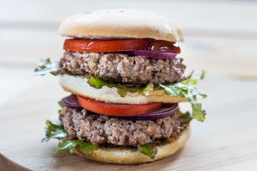 Home made double hamburger on a kraft paper.