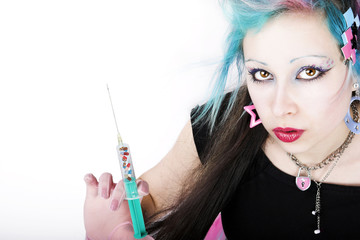 Schrille Junge Frau als bunte Krankenschwester im Gothic / Punk Look