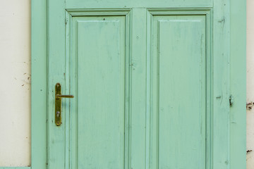 Old green wooden door