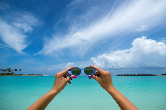 Picture Of Sunglasses On The Tropical Beach, Vacation. Traveller