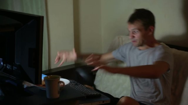 man playing video games on your computer. rabid gamer. I lost the game