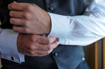 men wear a shirt and cufflinks