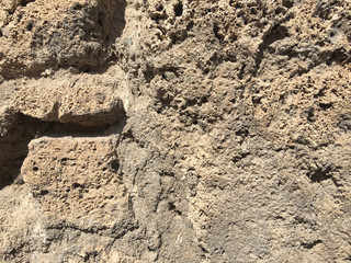 Antique stone background, wall with cracks, old times