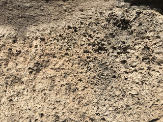Antique stone background, wall with cracks, old times