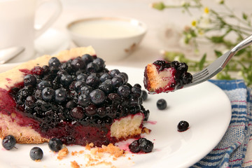 Slice of bilberry cake
