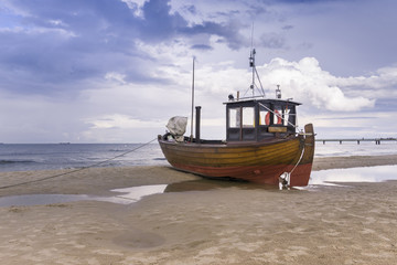 Fototapeta premium Germany, Usedom Island, Ahlbeck, fishing boat on beach