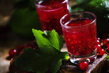 Lime lemonade with mashed red currants, selective focus