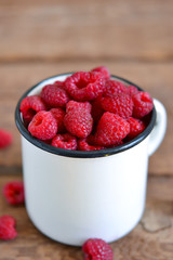 Fresh, juicy raspberries in a bowl 