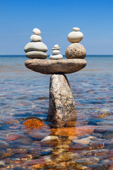Concept of tranquility and balance. Rock zen in the form of scal