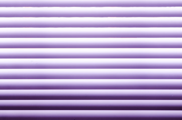 Background pattern of purple and white horizontal rows in a descending light and shade pattern.
