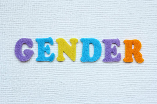 gender word on white handmade paper texture