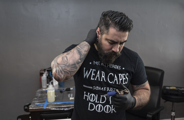 Tattoo artist posing 