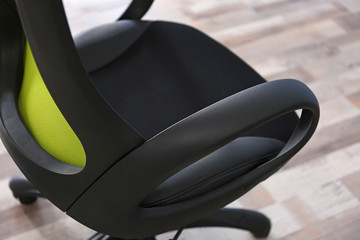 New office chair on the floor, closeup
