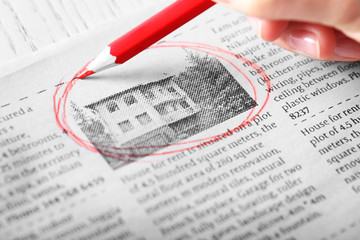 Search newspaper advertisements for information