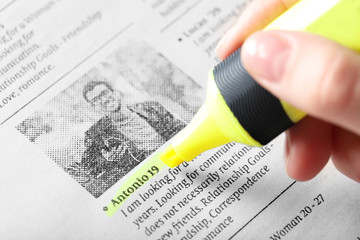 Search newspaper advertisements for information